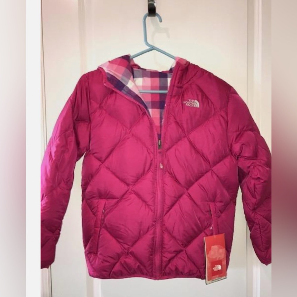 The North Face girls 550 down reversible Jacket no tags size L .